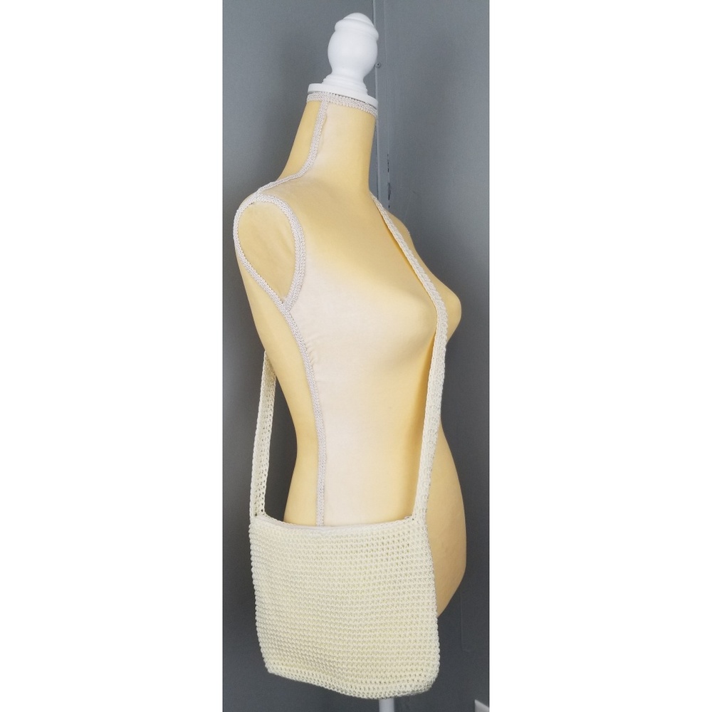 The Sak zip Ivory crochet crossbody messenger bag